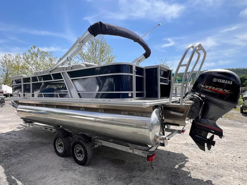 Slide: The Image of 2021 Starcraft EX Fish EX 22 FD pontoon boat with Yamaha outboard motor on trailer. - 3