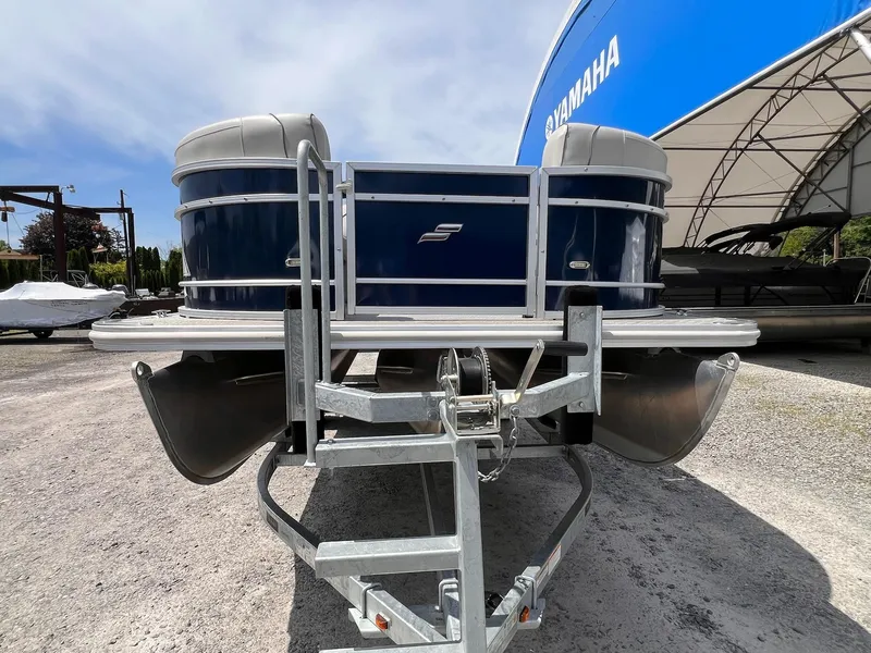 Slide: The Image of 2021 Starcraft EX Fish EX 22 FD pontoon boat on trailer, outdoor display. - 6