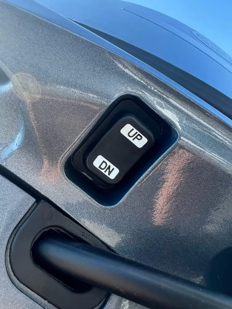 Slide: The Image of 2024 Starcraft Patriot 16 SC boat control panel with "UP" and "DN" buttons. - 8