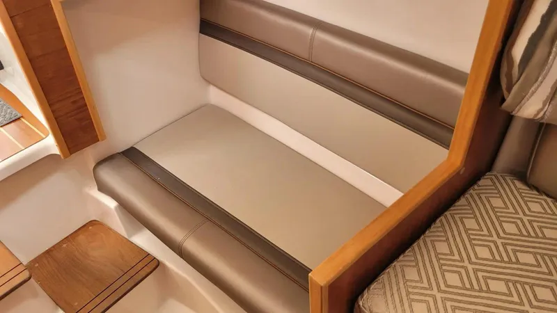 Slide: The Image of Interior seating of a 2021 Cutwater C-28 boat, featuring sleek, modern design and comfortable cushions. - 28