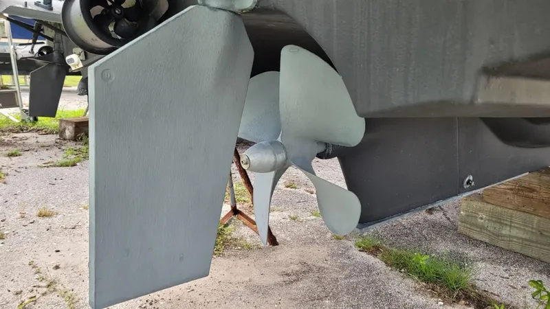 Slide: The Image of Propeller and rudder of 2021 Cutwater C-28 boat on dry land. - 8