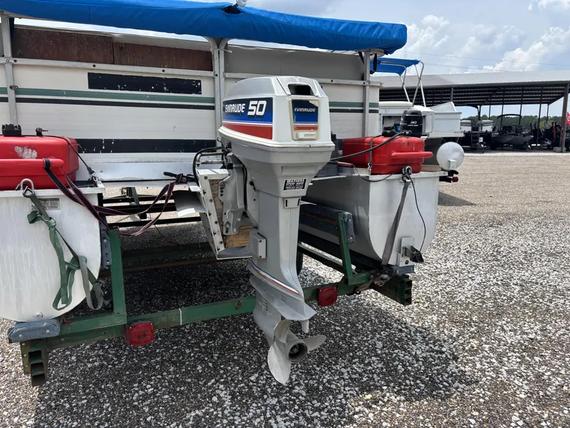 Slide: The Image of 1987 Lowe FISH AND FUN 18 boat with Evinrude 50 outboard motor on trailer. - 8