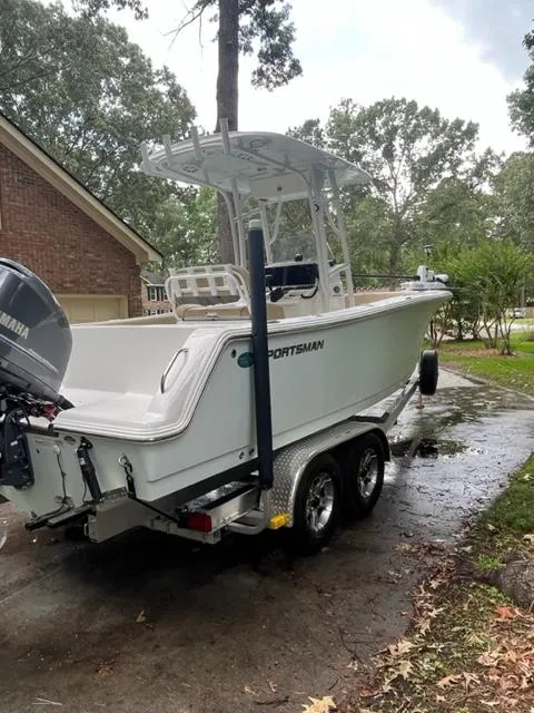 Slide: The Image of 2014 Sportsman Heritage 231 Center Console boat on trailer in driveway. - 6