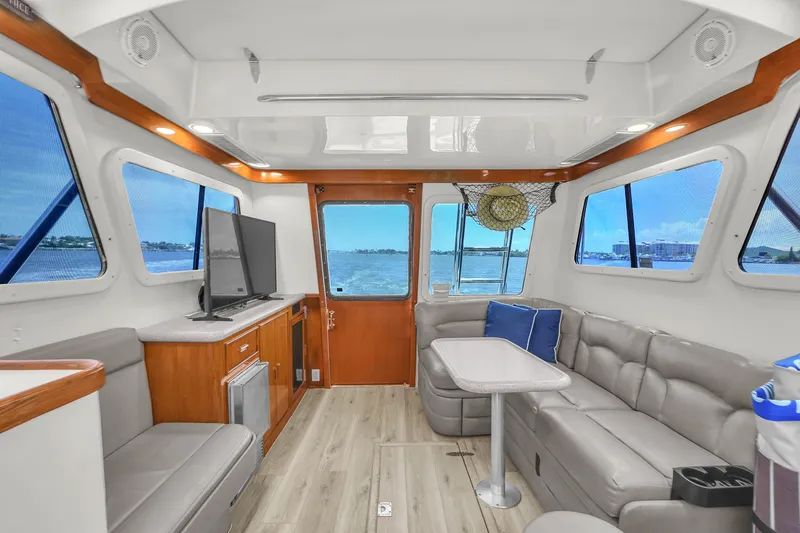 Slide: The Image of Luxurious interior of a 2001 Mediterranean 38 Convertible yacht with modern furnishings. - 11