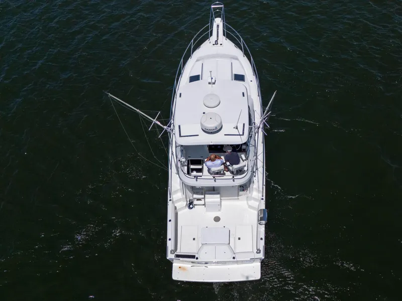 Slide: The Image of Aerial view of a 2001 Mediterranean 38 Convertible yacht on the water. - 3