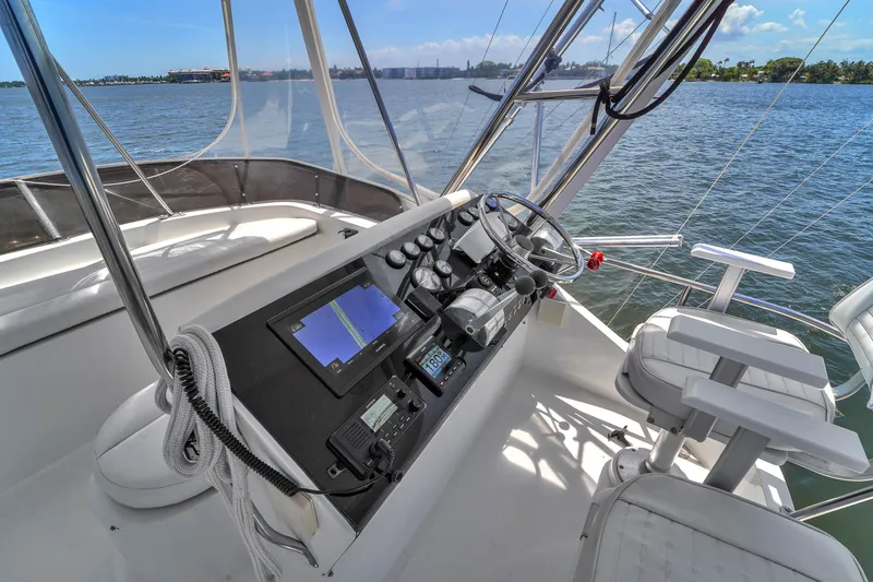 Slide: The Image of 2001 Mediterranean 38 Convertible yacht helm with navigation equipment and ocean view. - 31