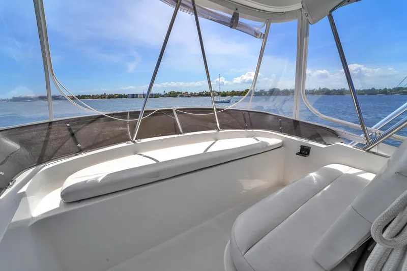 Slide: The Image of 2001 Mediterranean 38 Convertible yacht interior with ocean view and seating area. - 32