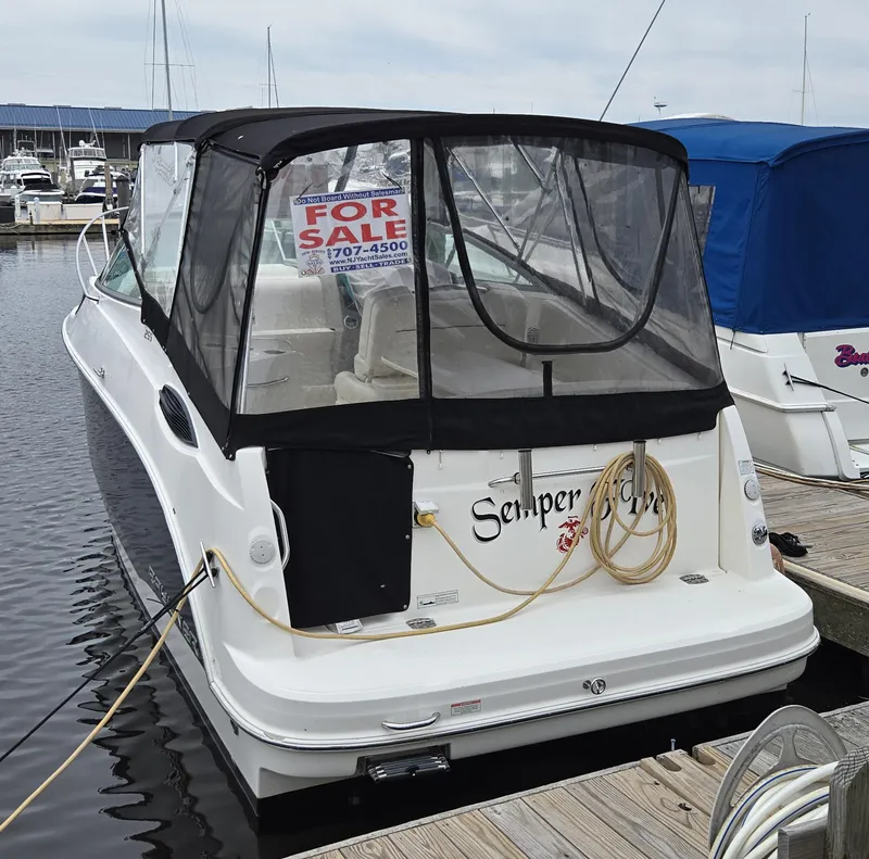 Slide: The Image of 2012 Bayliner 255 Cruiser for sale at marina dock. - 4