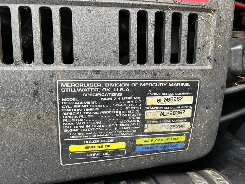 Slide: The Image of Label on MerCruiser engine detailing specifications for a 1999 Sea Ray 270 Sundancer. - 22