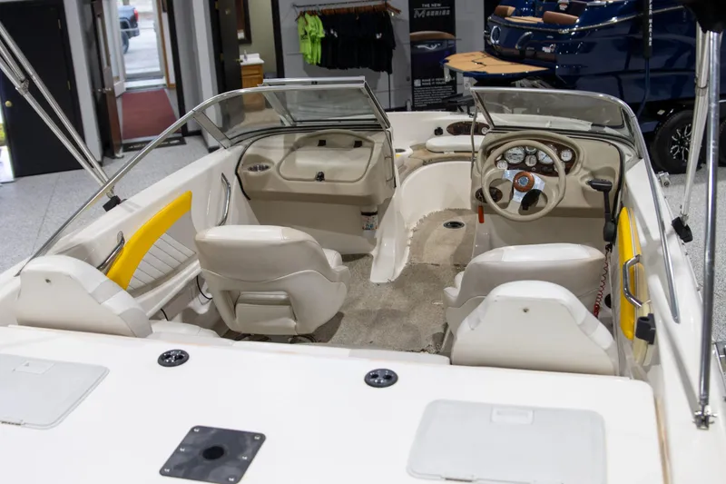 Slide: The Image of 2007 Glastron GT 205 Ski & Fish boat interior with steering wheel and seating. - 4