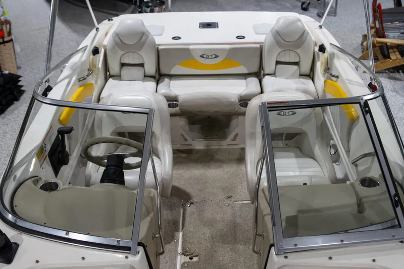 Slide: The Image of 2007 Glastron GT 205 Ski & Fish boat interior with seating and steering wheel. - 9