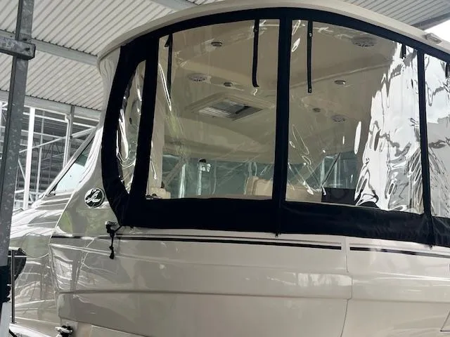 Slide: The Image of 2004 Sea Ray 390 Motor Yacht with clear enclosure in marina. - 17