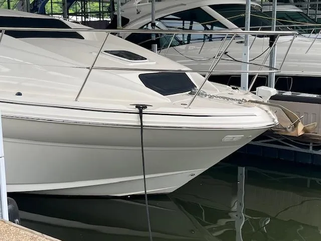 Slide: The Image of 2004 Sea Ray 390 Motor Yacht docked in marina, side view. - 6