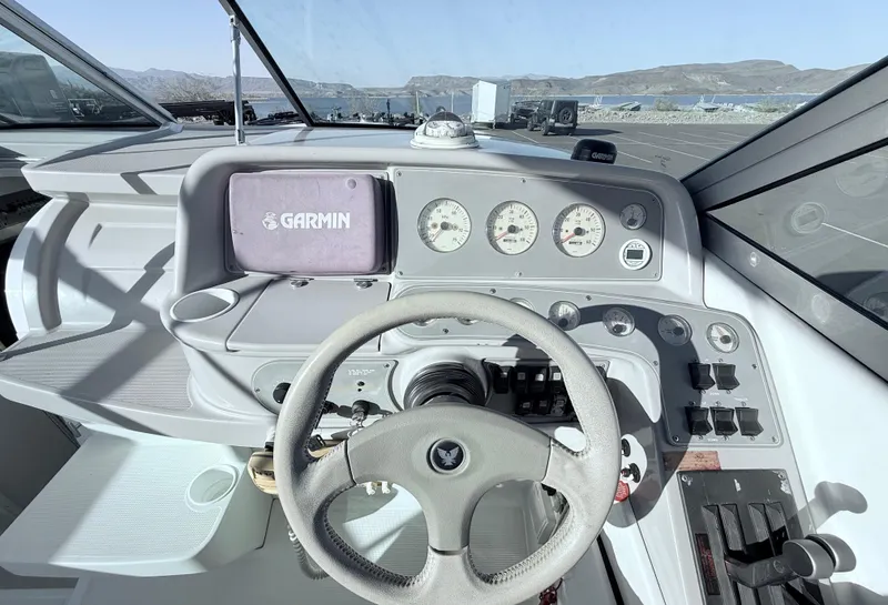 Slide: The Image of Cockpit of 2000 Formula 330 Sun Sport boat with Garmin navigation system. - 11