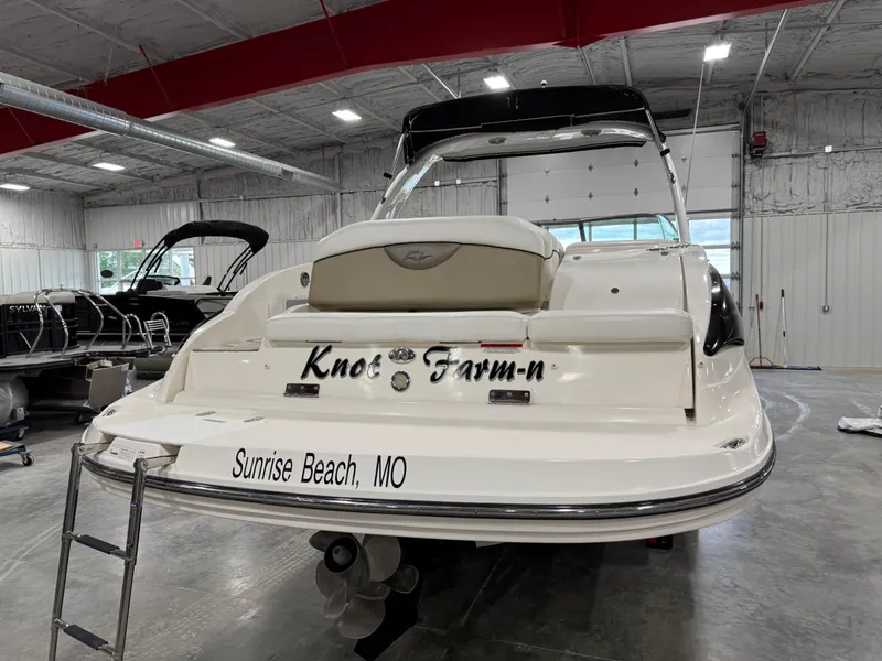 Slide: The Image of 2012 Rinker 296 Captiva Bowrider boat in indoor storage, Sunrise Beach, MO. - 5