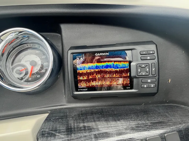 Slide: The Image of Dashboard of 2018 Tahoe Cascade 2585 CR with Garmin fishfinder display. - 7