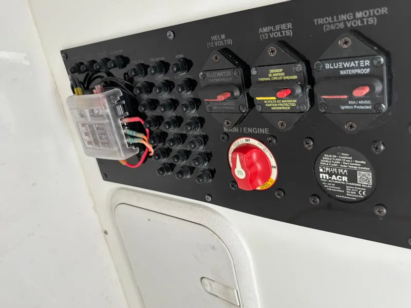 Slide: The Image of Control panel of 2023 Blazer 2700 HYBRID BAY boat with switches and wiring. - 20
