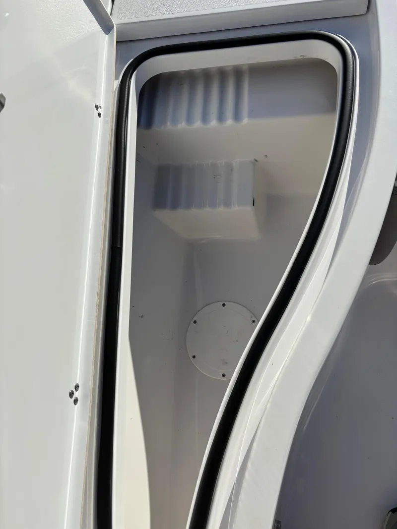 Slide: The Image of 2023 Blazer 2700 HYBRID BAY storage compartment with sleek design and secure seal. - 24