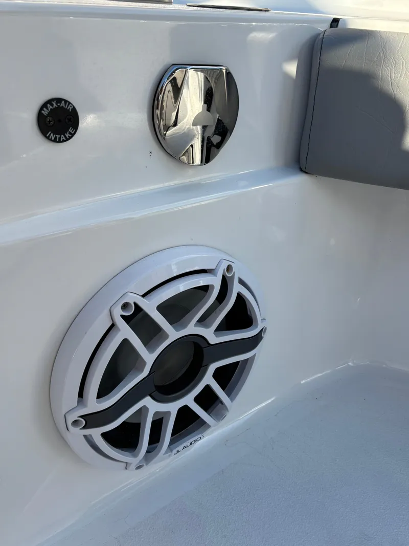 Slide: The Image of 2023 Blazer 2700 HYBRID BAY boat interior with speaker and air intake vent. - 28