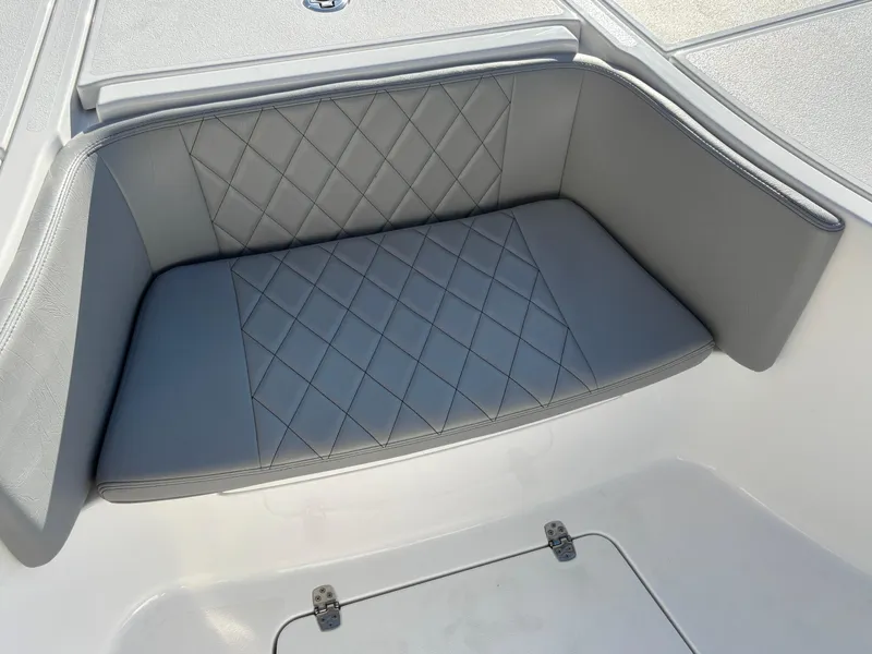 Slide: The Image of 2023 Blazer 2700 HYBRID BAY boat with gray diamond-stitched seating. - 29