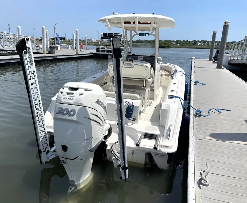 Slide: The Image of 2017 Boston Whaler 230 Outrage boat docked with Mercury 300 engine. - 9