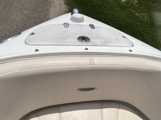 Slide: The Image of 2006 Chaparral 204 SSi boat bow with white upholstery and deck details. - 10