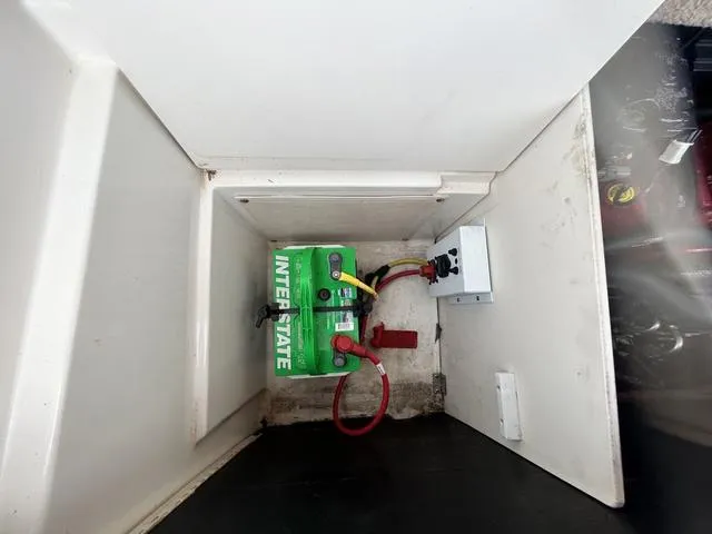 Slide: The Image of Battery compartment of 2006 Chaparral 204 SSi with Interstate battery installed. - 40