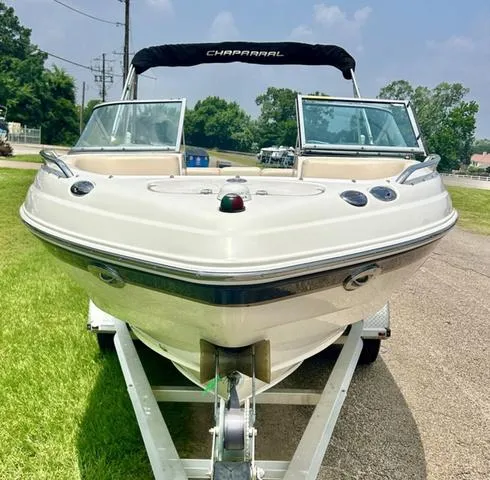 Slide: The Image of 2006 Chaparral 204 SSi boat on trailer, front view, outdoors. - 5