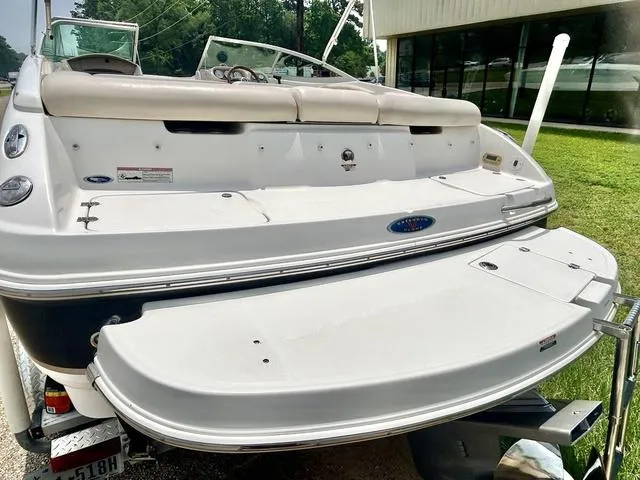 Slide: The Image of 2006 Chaparral 204 SSi boat rear view with swim platform and seating. - 8