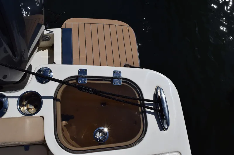 Slide: The Image of 2020 Scout 255 Dorado boat deck with storage compartment and sleek design. - 17