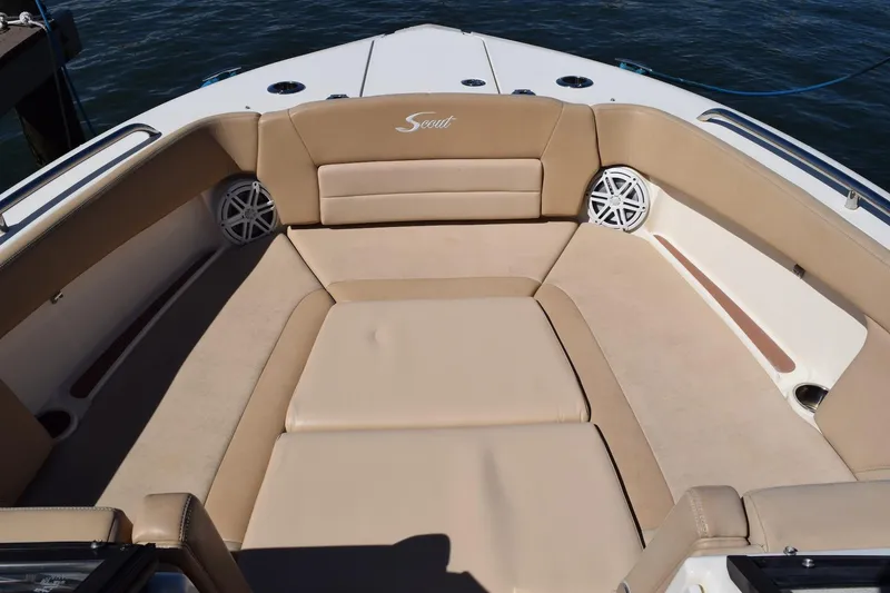 Slide: The Image of 2020 Scout 255 Dorado boat interior with beige seating and water view. - 5