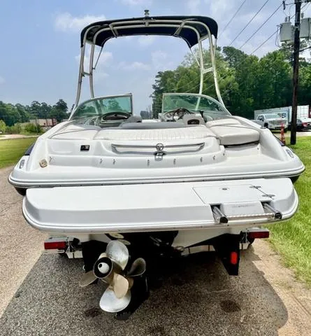 Slide: The Image of 2005 Crownline 216 LS boat, rear view, on a trailer, outdoors. - 6