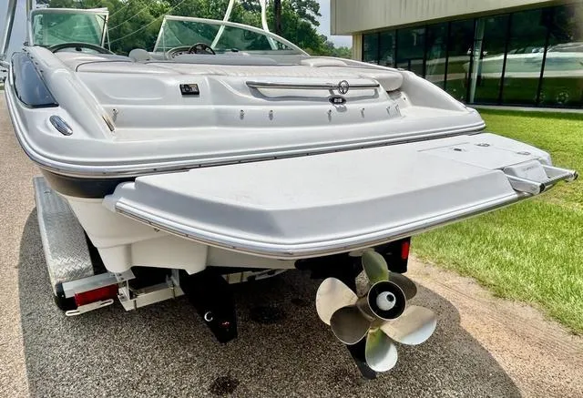 Slide: The Image of 2005 Crownline 216 LS boat rear view with propeller and swim platform. - 7