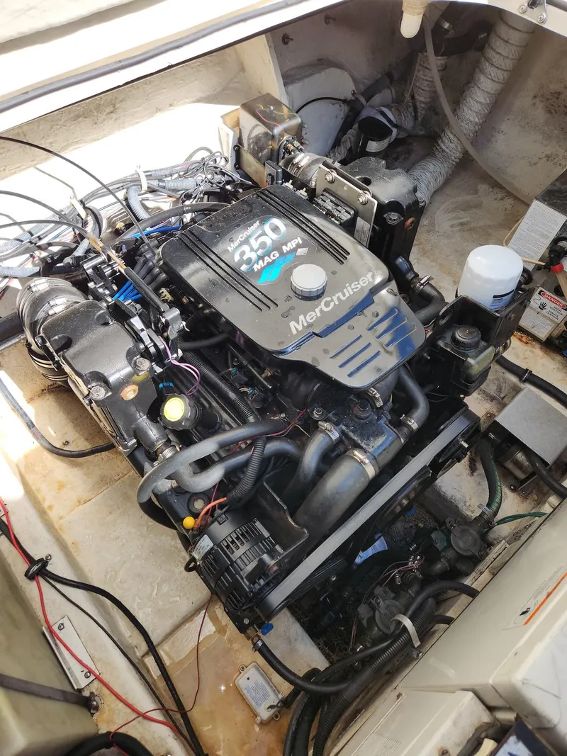 Slide: The Image of Engine compartment of a 2006 Larson Cabrio 260 with MerCruiser 350 MAG MPI engine. - 38