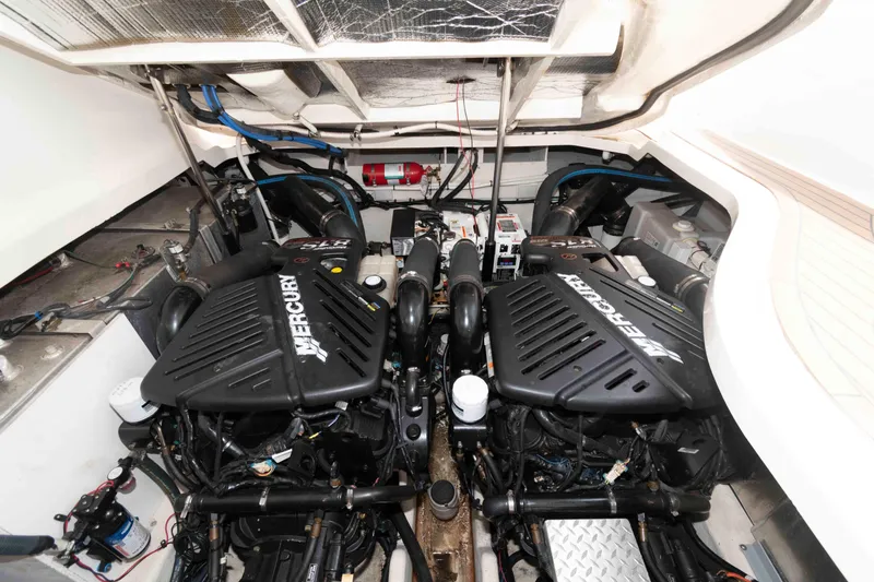 Slide: The Image of Engine room of 2008 Sea Ray 330 Sundancer with twin MerCruiser engines. - 21