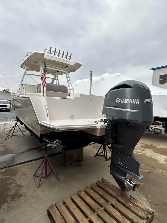 Slide: The Image of 2021 Cutwater C-24 CW boat with Yamaha outboard motor on display. - 3