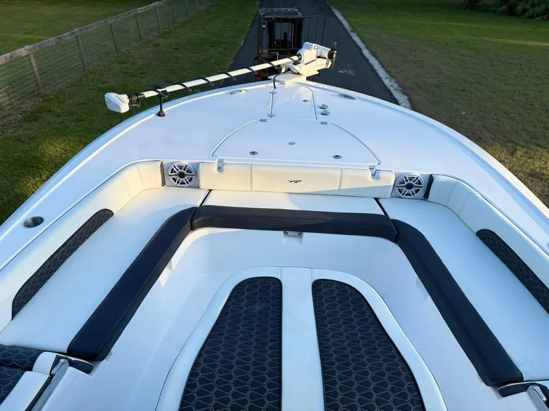 Slide: The Image of 2025 Tidewater 3100 Carolina Bay boat with spacious seating and modern design. - 16