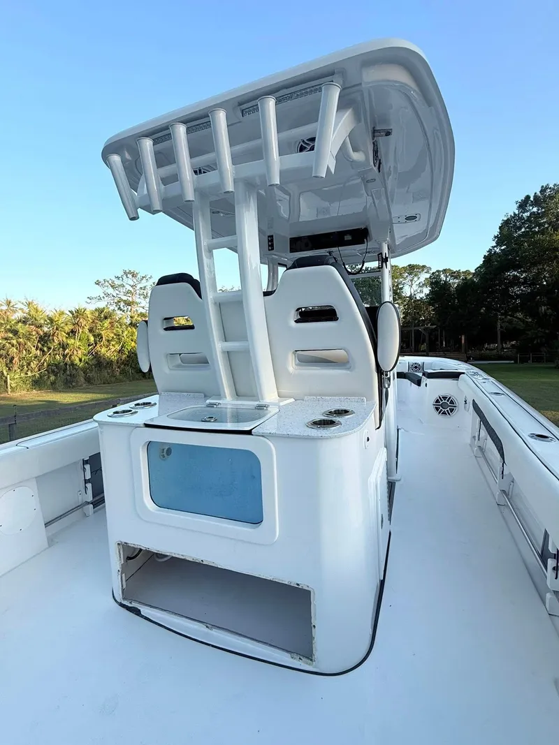 Slide: The Image of 2025 Tidewater 3100 Carolina Bay boat with sleek design and spacious deck. - 29