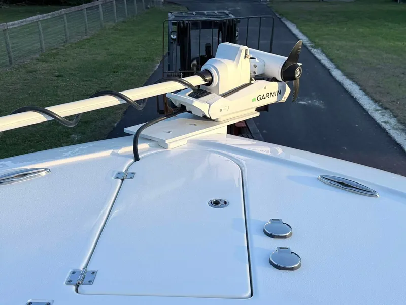 Slide: The Image of 2025 Tidewater 3100 Carolina Bay boat with Garmin trolling motor on deck. - 33