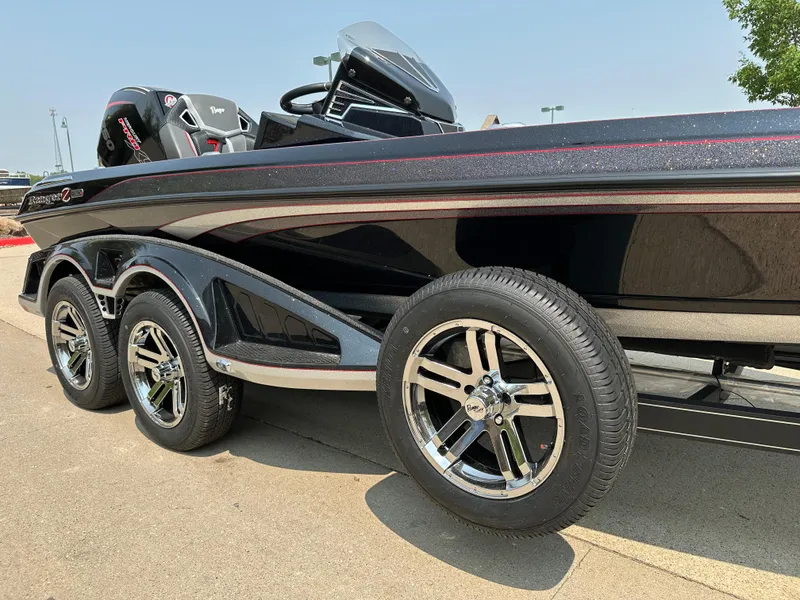 Slide: The Image of 2025 Ranger Z520R Cup-Equipped boat with triple-axle trailer, sleek black design. - 4