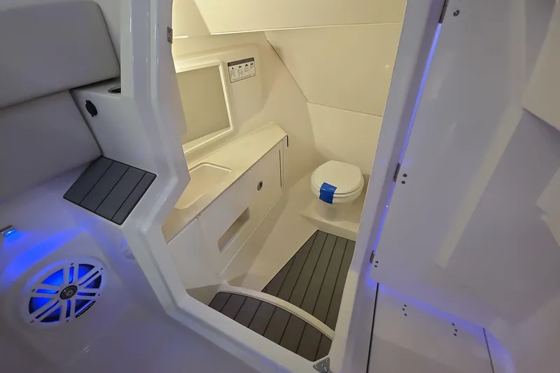 Slide: The Image of 2026 Sailfish 316 DC boat interior with modern bathroom and sleek design. - 40