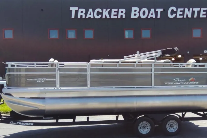 The Image of 2025 Sun Tracker Fishin' Barge 20 DLX pontoon boat at Tracker Boat Center. - 0