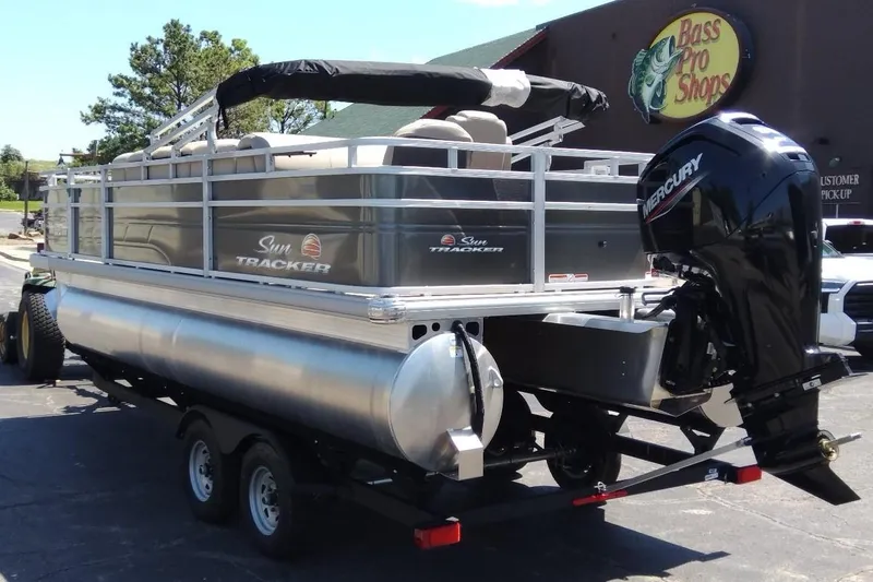 Slide: The Image of 2025 Sun Tracker Fishin' Barge 20 DLX pontoon boat at Bass Pro Shops. - 5