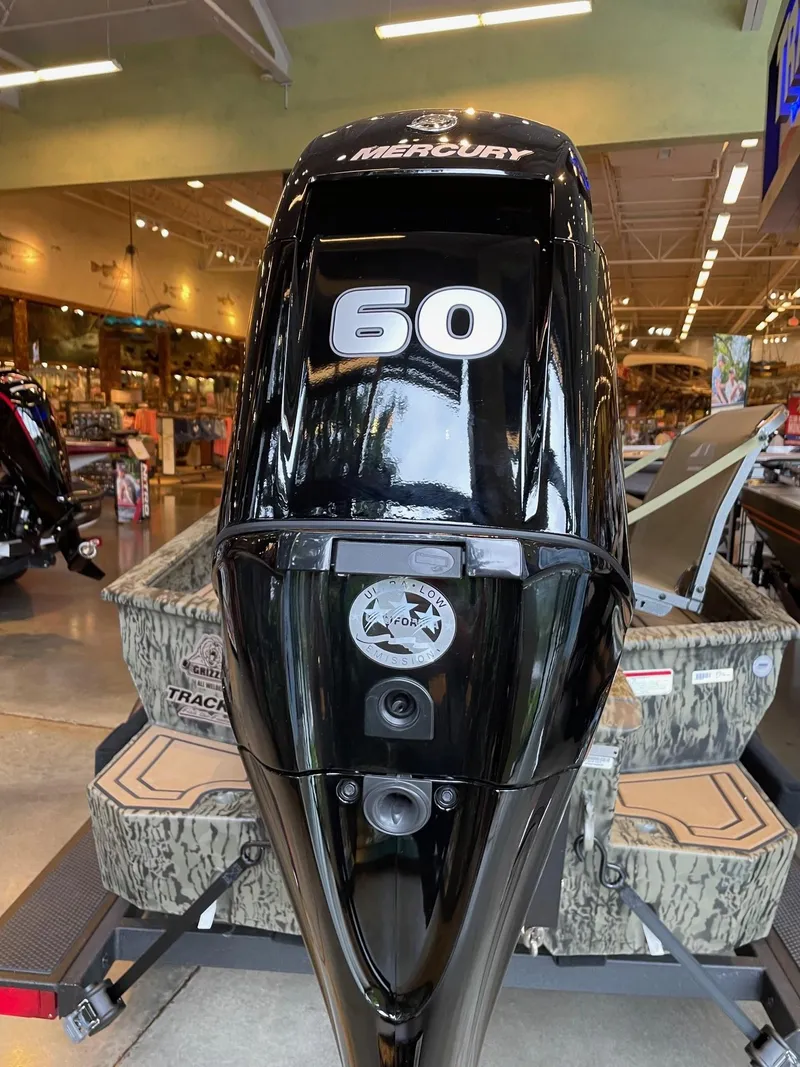 Slide: The Image of 2025 Tracker Grizzly 1650 T Prairie Wings Edition with Mercury 60 outboard motor. - 2