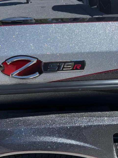 Slide: The Image of 2025 Ranger Z519R Cup-Equipped boat with metallic finish and logo detail. - 6