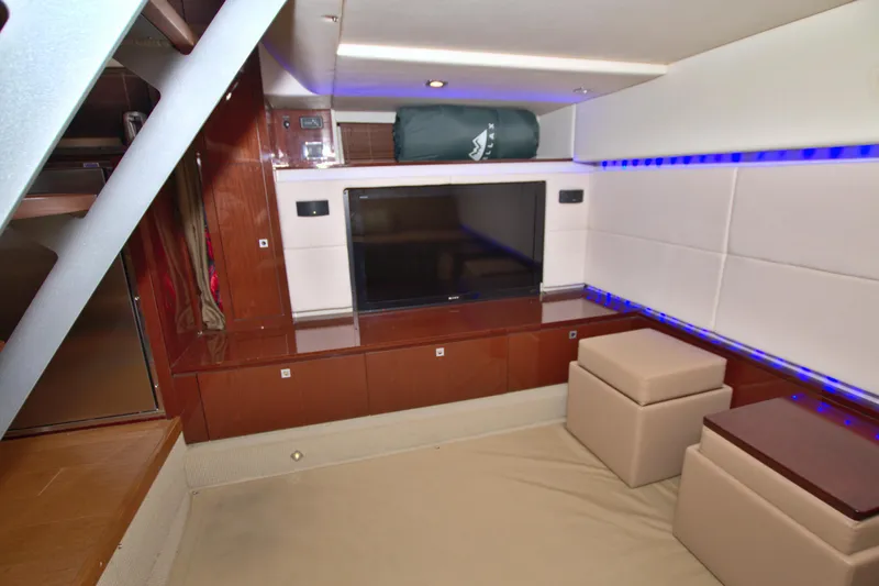 Slide: The Image of Luxurious interior of 2013 Sea Ray 450 Sundancer yacht with modern entertainment area. - 44
