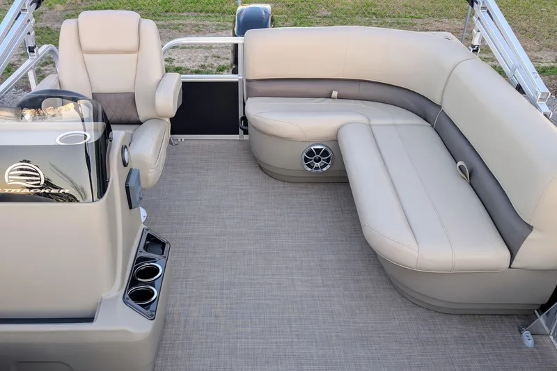 Slide: The Image of 2025 Sun Tracker Party Barge 16 DLX interior with plush seating and modern design. - 4