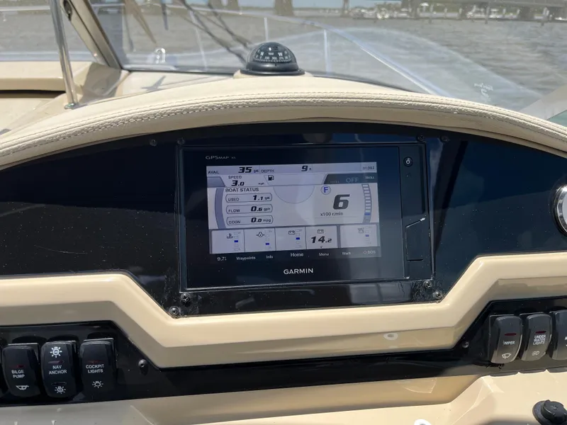 Slide: The Image of Dashboard of 2020 Regal 26 XO boat with Garmin GPS display. - 17