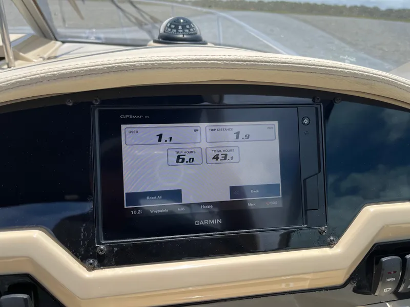 Slide: The Image of Dashboard of 2020 Regal 26 XO boat with Garmin GPS display. - 18