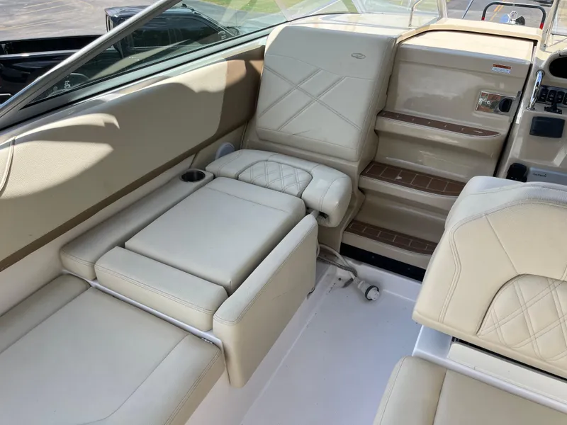 Slide: The Image of Luxurious interior of 2020 Regal 26 XO boat with beige leather seating. - 23